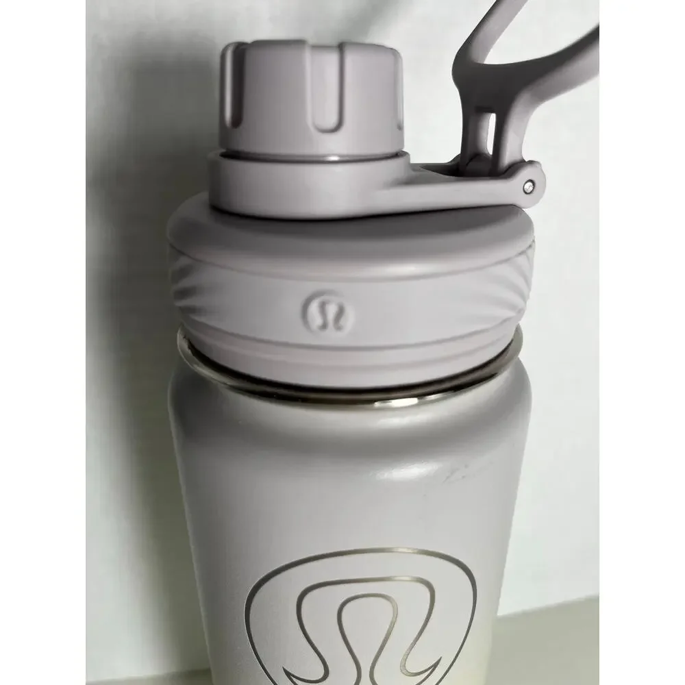 Lululemon 24 oz back to life water bottle , metal , yellow and gray ombre color
